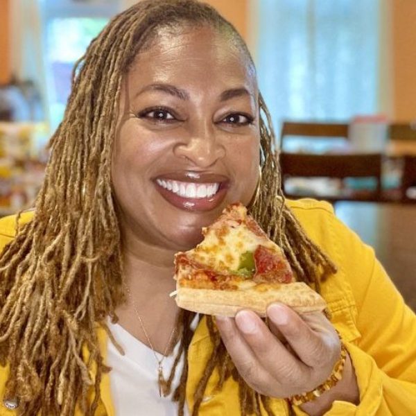 Lisa eating pizza